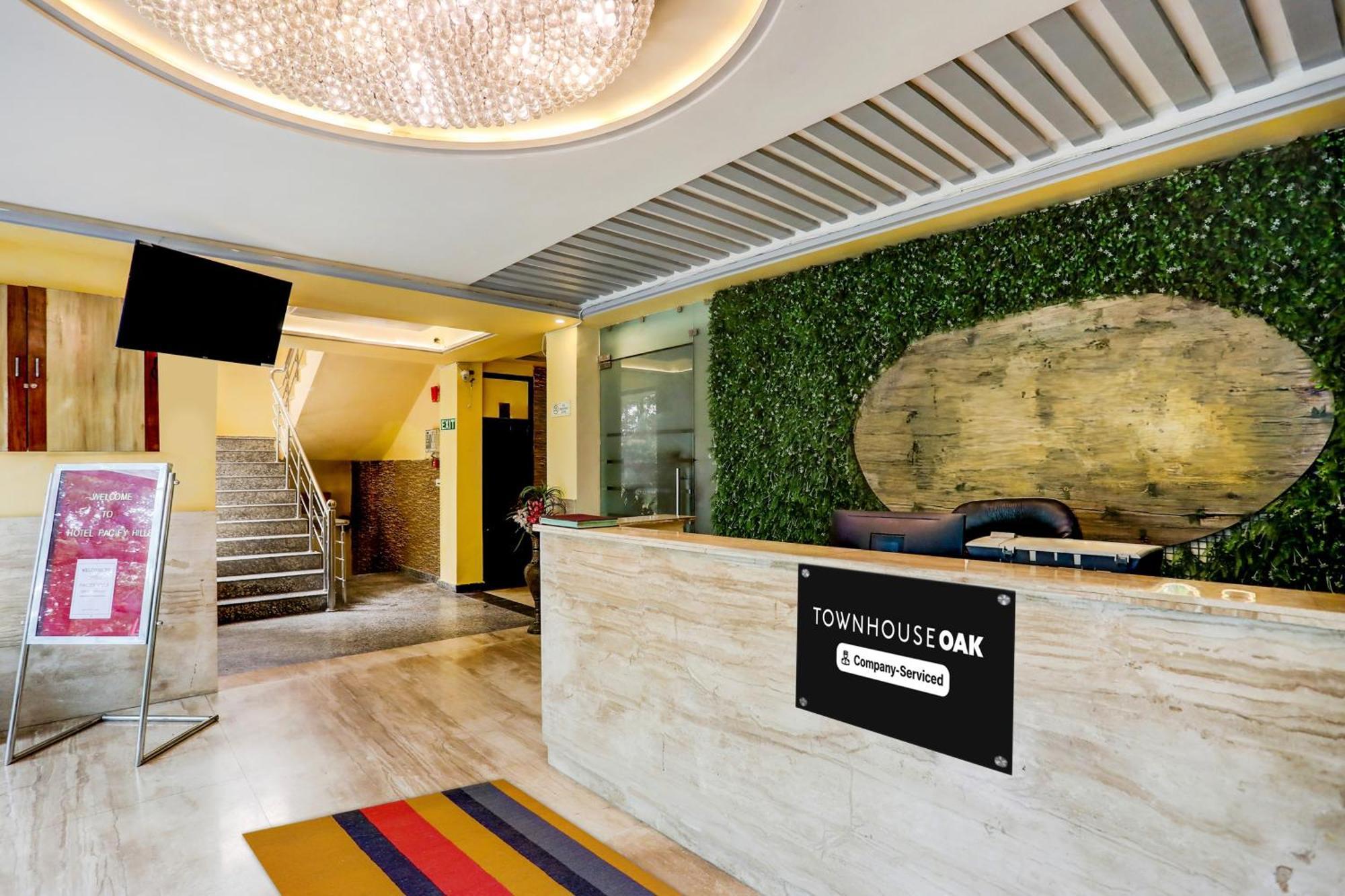 Super Townhouse Oak Pacify Hills Hotel Rajpur ภายนอก รูปภาพ