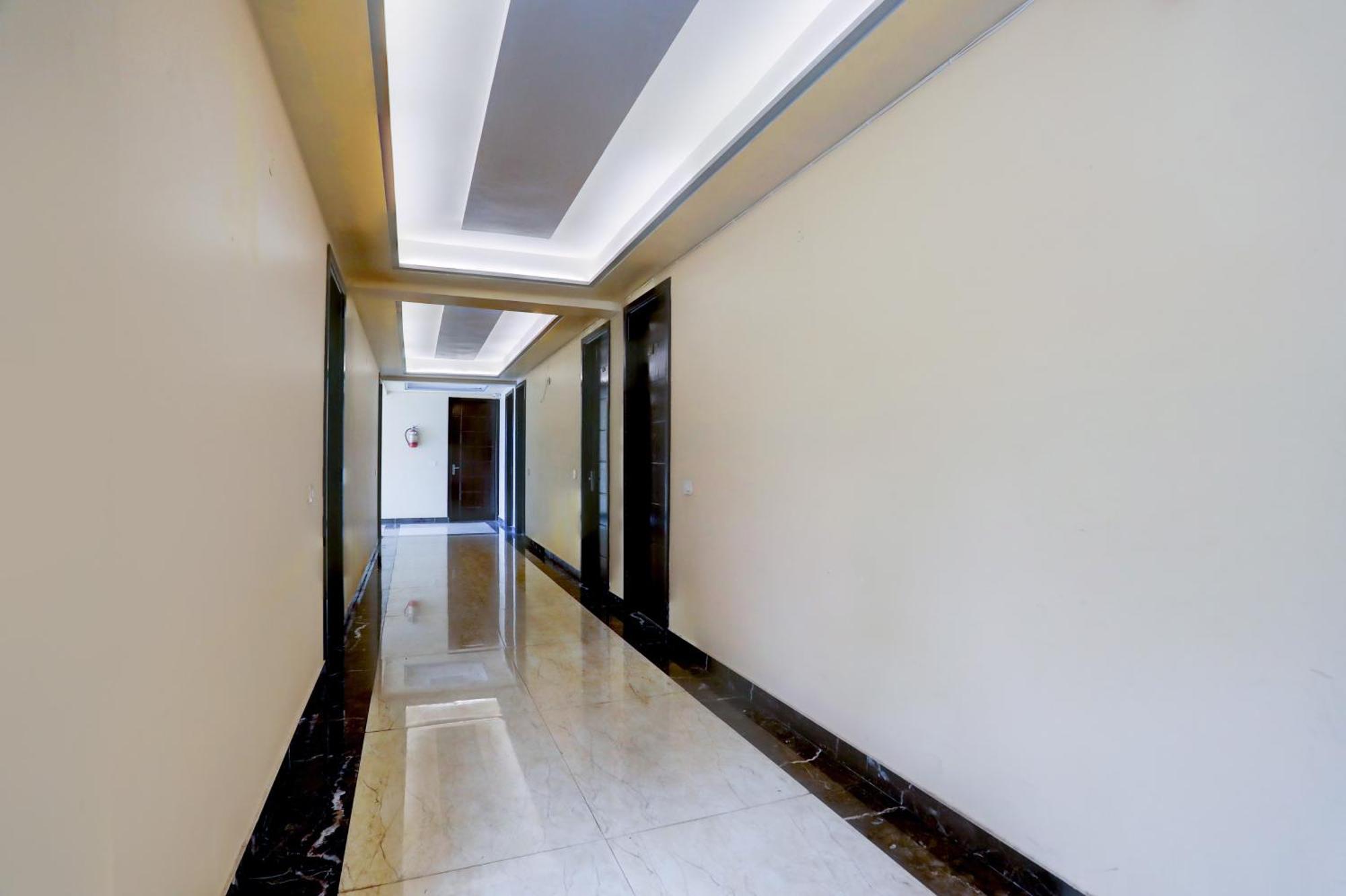 Super Townhouse Oak Pacify Hills Hotel Rajpur ภายนอก รูปภาพ